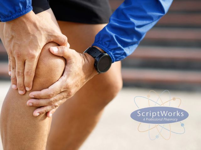 Person Holding Knee Experiencing Joint Pain