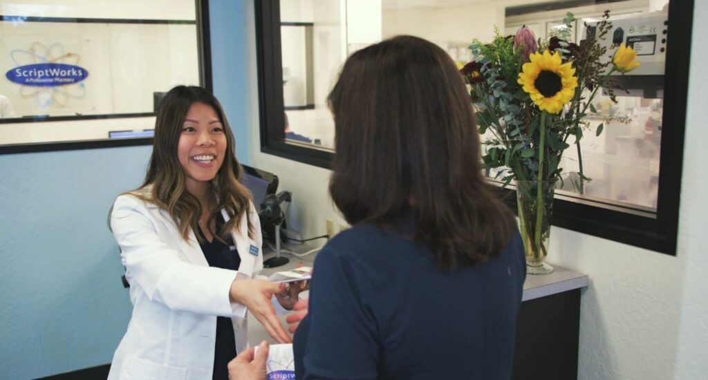 ScriptWorks Pharmacist Assisting Patient at Compounding Pharmacy