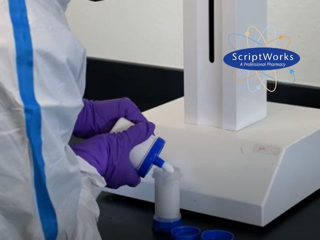Pharmacist Handling Compounded Topical Cream
